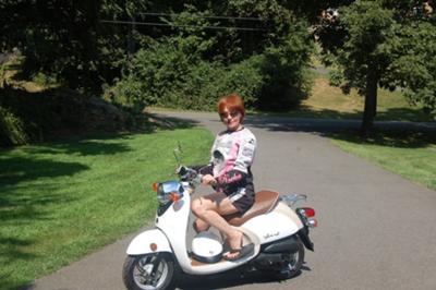 Terri on her scooter